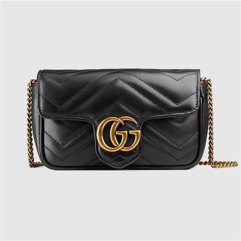 Super mini borsa a spalla GG in pelle nera con motivo GG